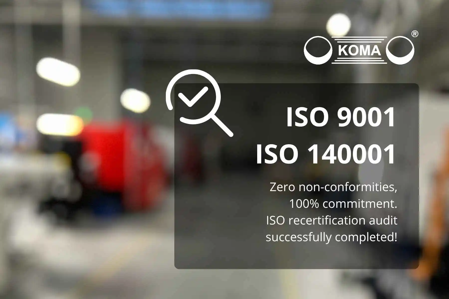 An operator at a modern machine in the KOMA production hall in Słone, during process verification as part of the ISO 9001:2015 and 14001:2015 certification audit.